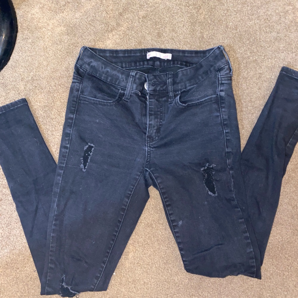 Ripped black skinny jeans